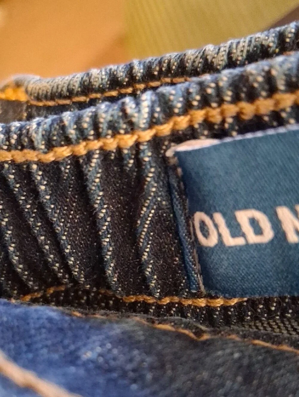 Old Navy Red and Black Buffalo-Check Crewneck Sweater With Blue Jean.